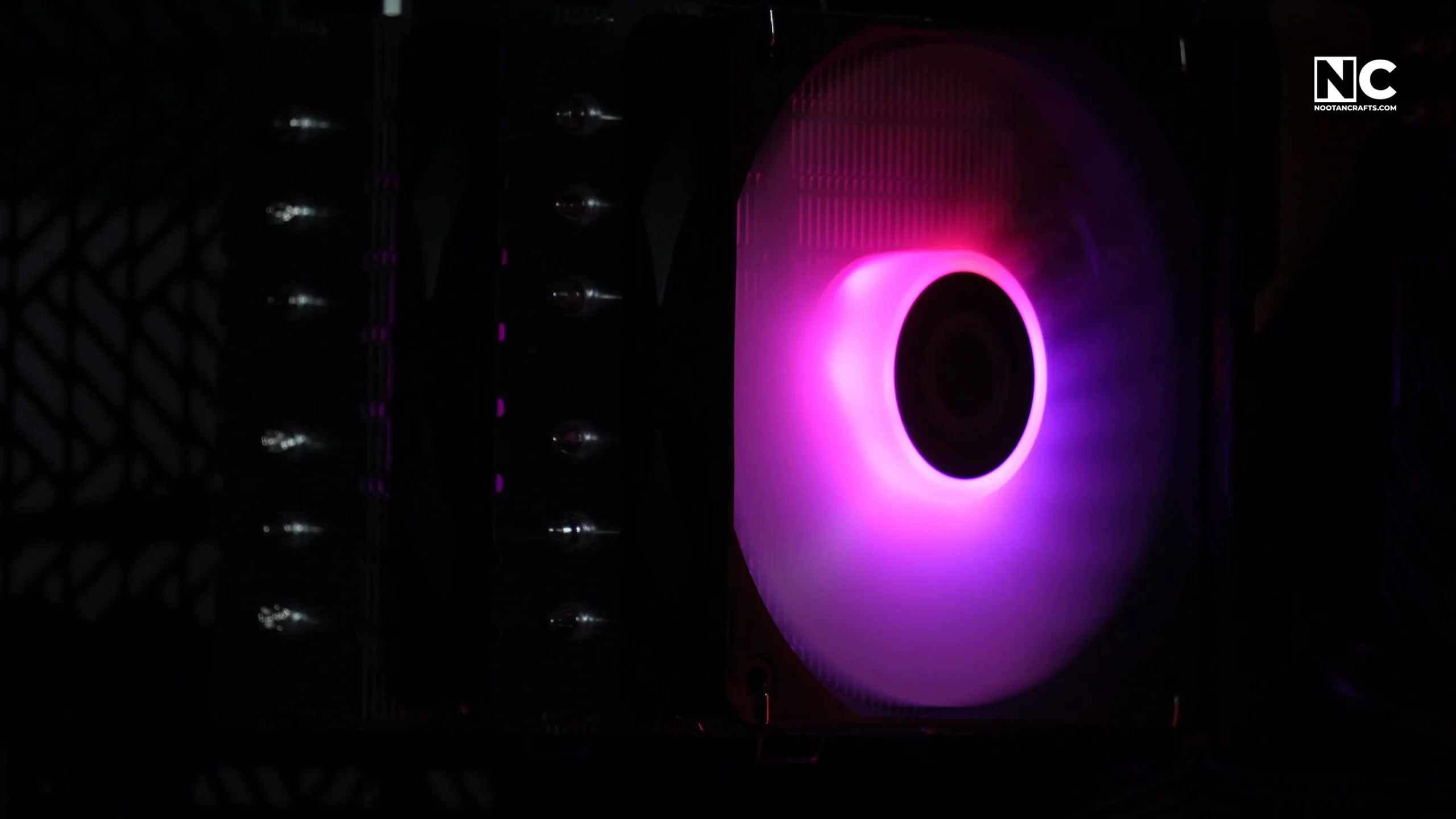 CF120 ARGB fan running with its lighting on inside the case
