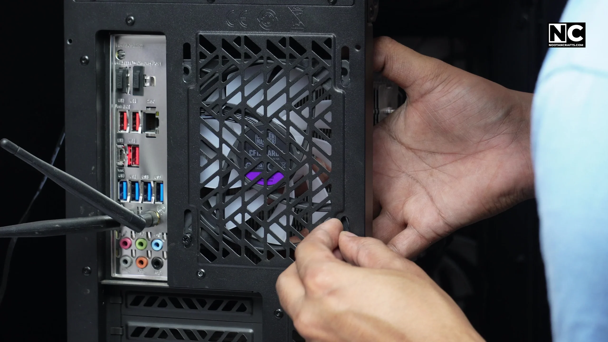 Driving the supplied screws through the case panel into the CF120 fan frame