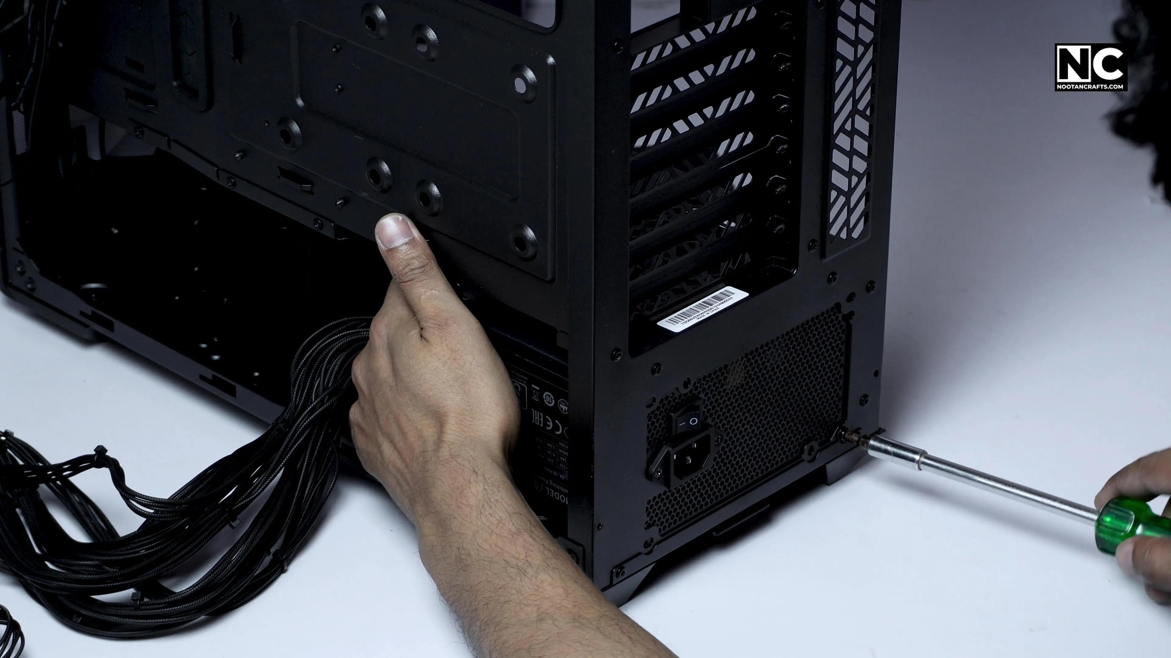 Installing the Cooler Master power supply into the case