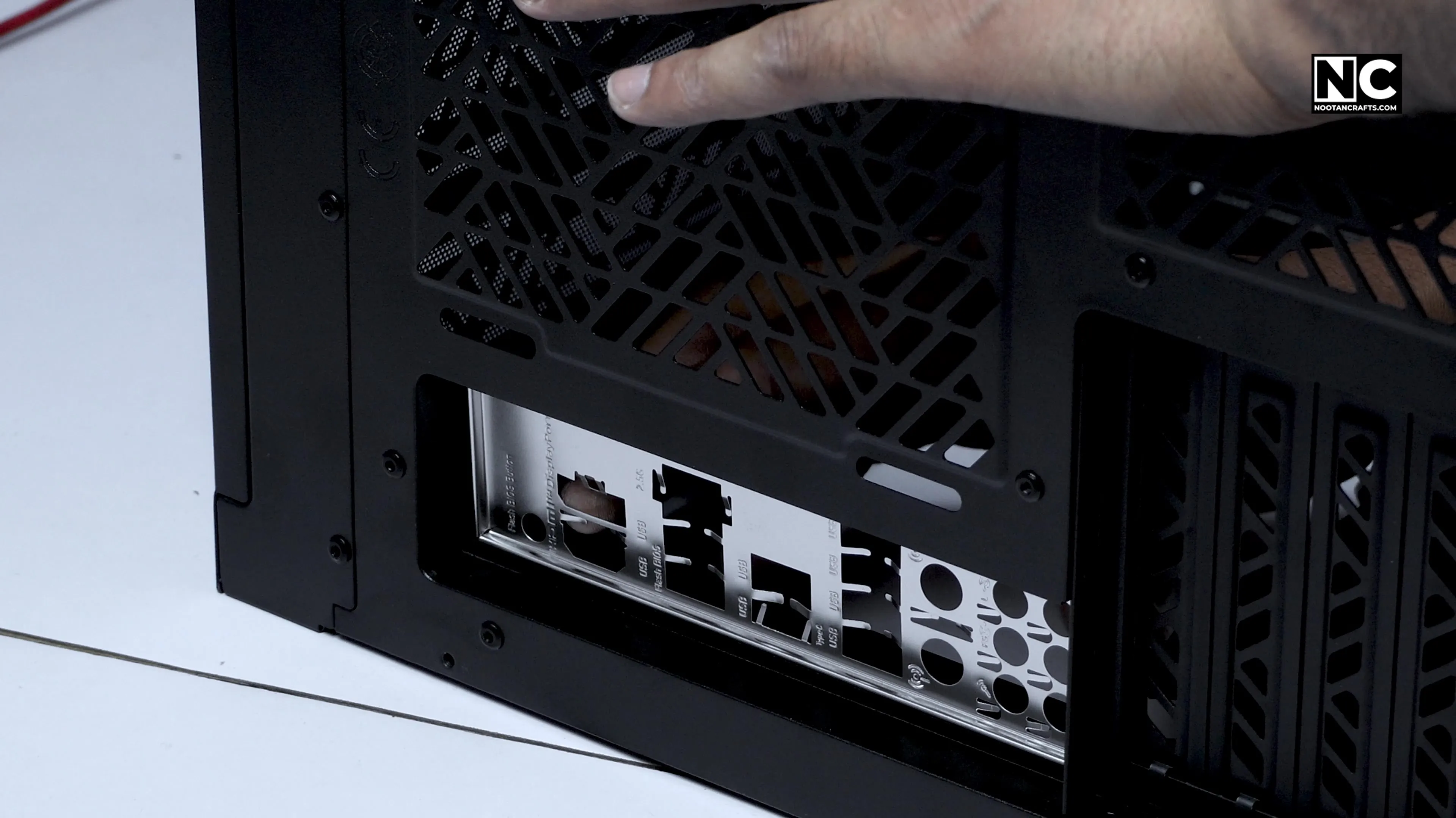 Fitting the I/O backplate into the case