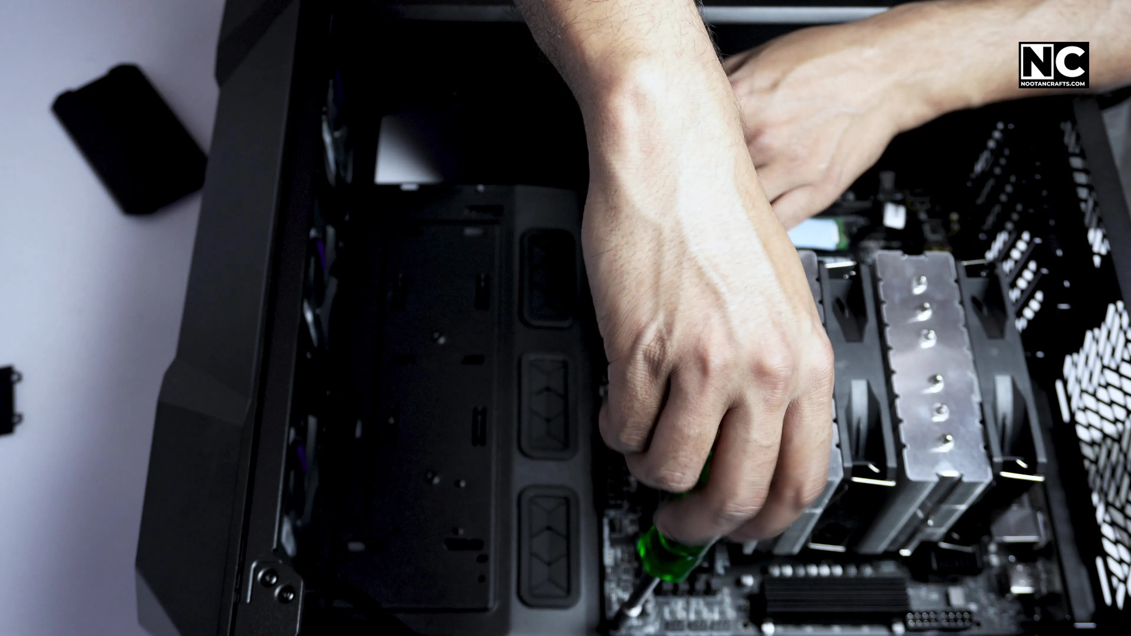 Securing the motherboard to the standoffs