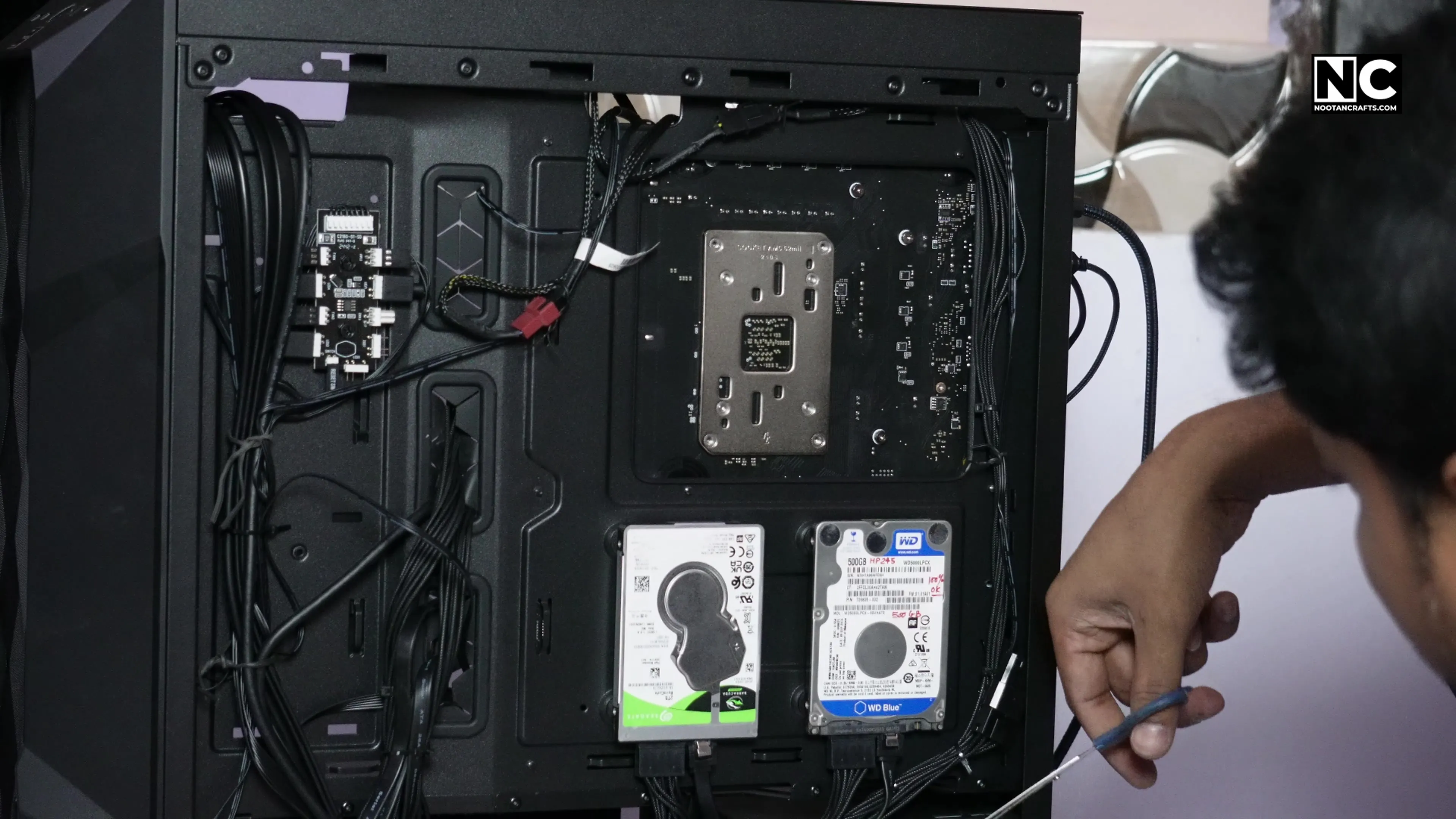 Cables routed and secured behind the motherboard tray