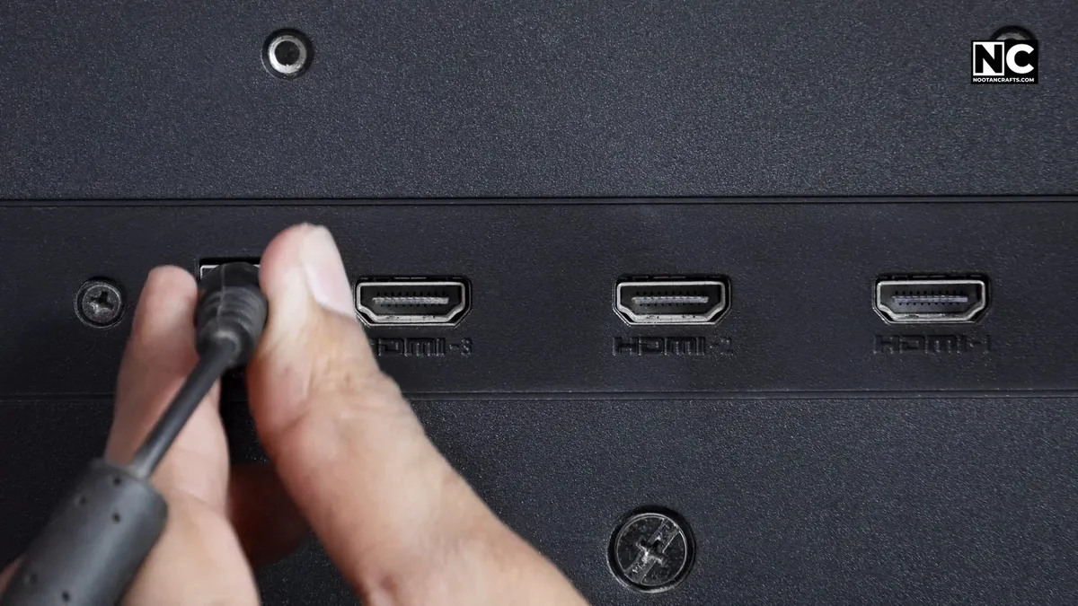 Connecting the power cable to the monitor