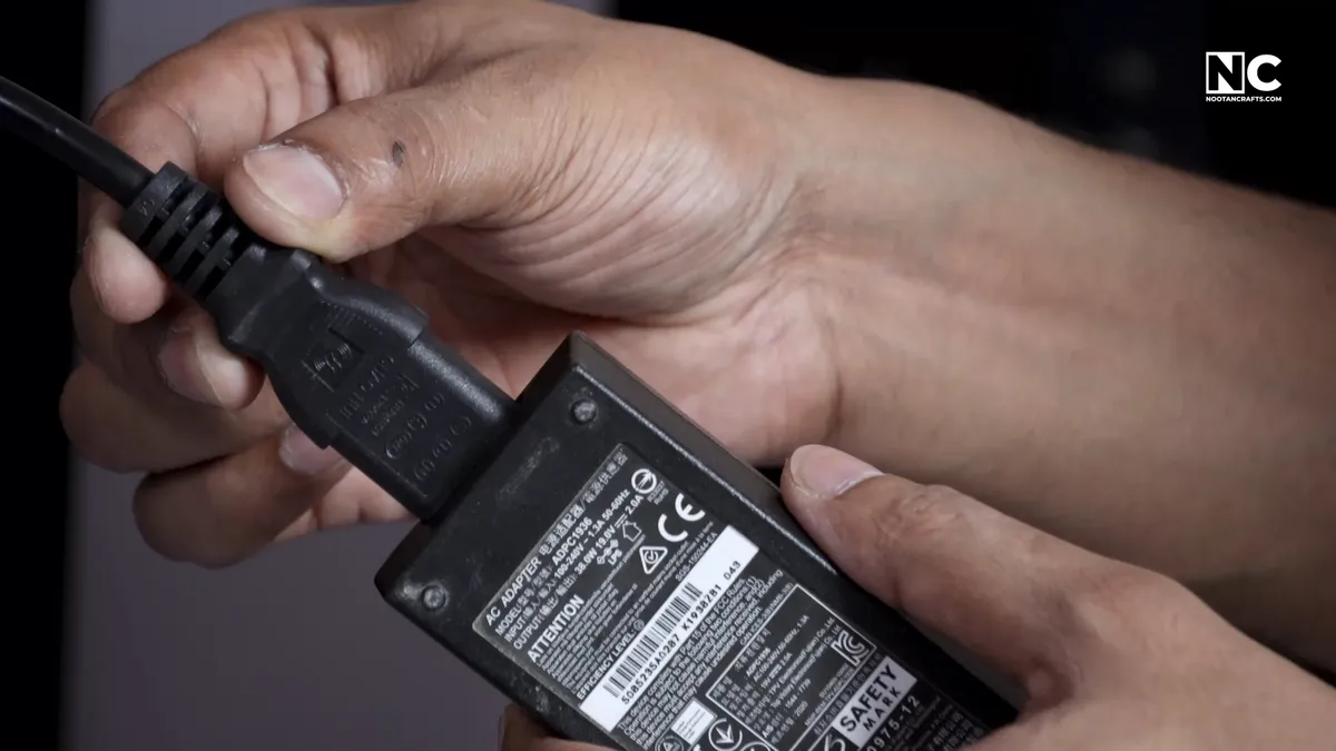 Plugging the display cable into the monitor's video input