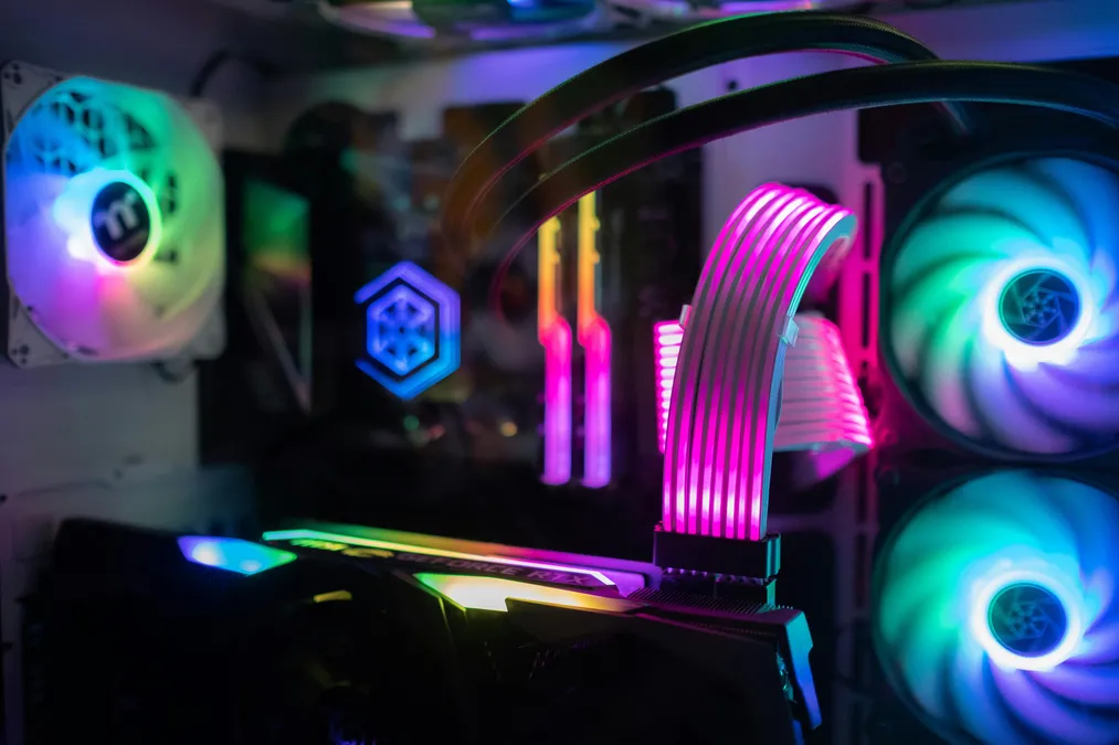 Gaming PC interior lit by RGB fans and components